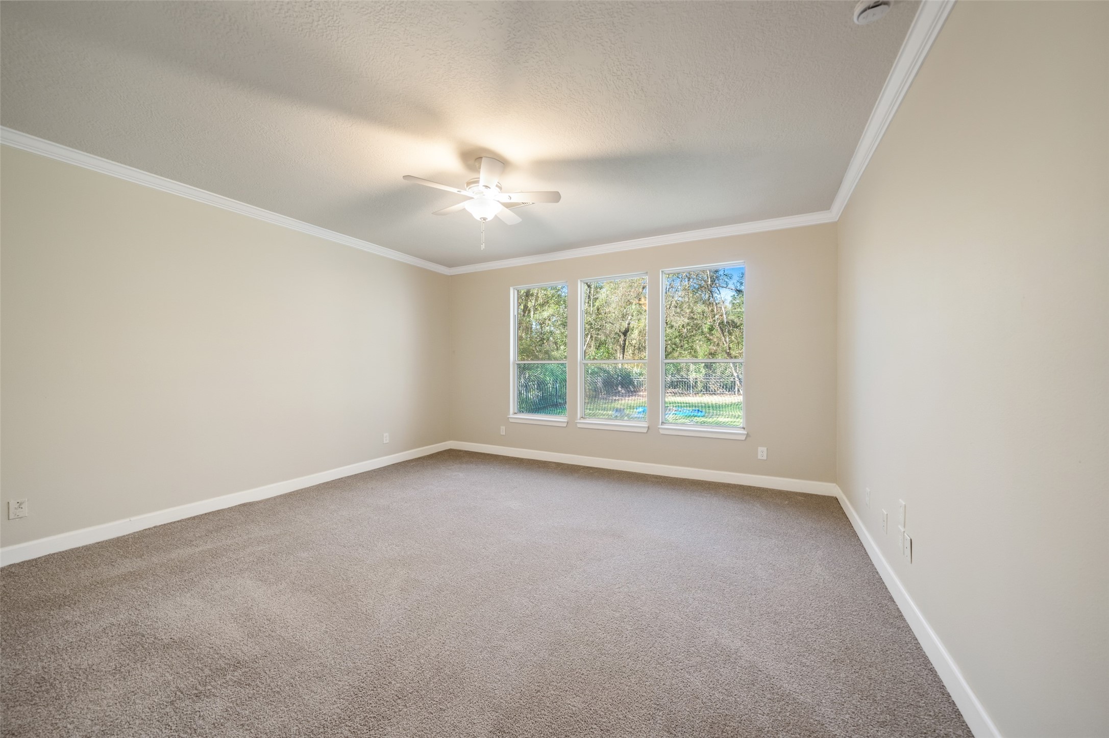 29627 Spring Forest Drive Spring, TX 77386 - Photo 14 of 29 Large primary bedroom with new carpet and ceiling fan.