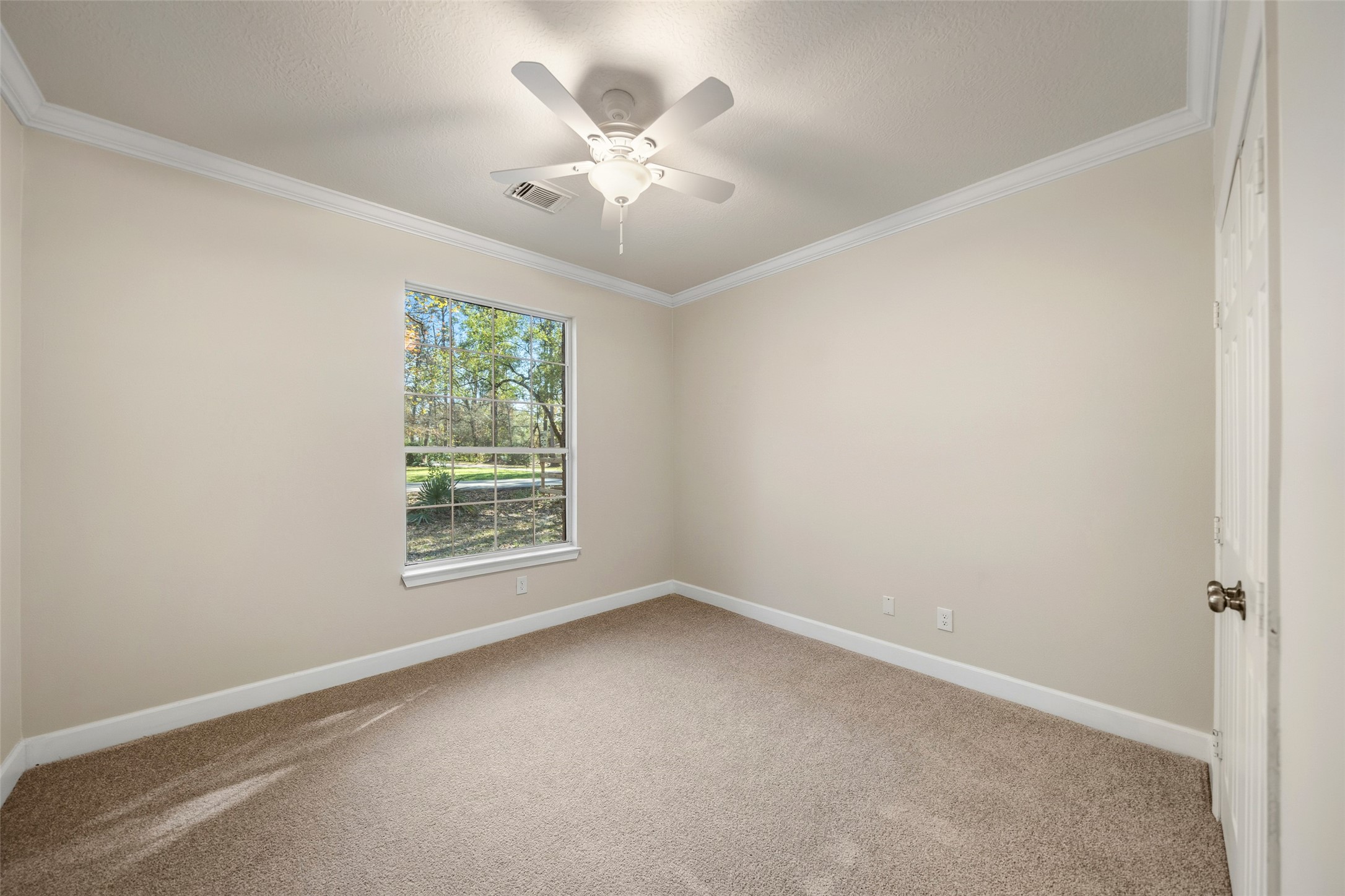 29627 Spring Forest Drive Spring, TX 77386 - Photo 20 of 29 Secondary bedroom at front corner of the house.