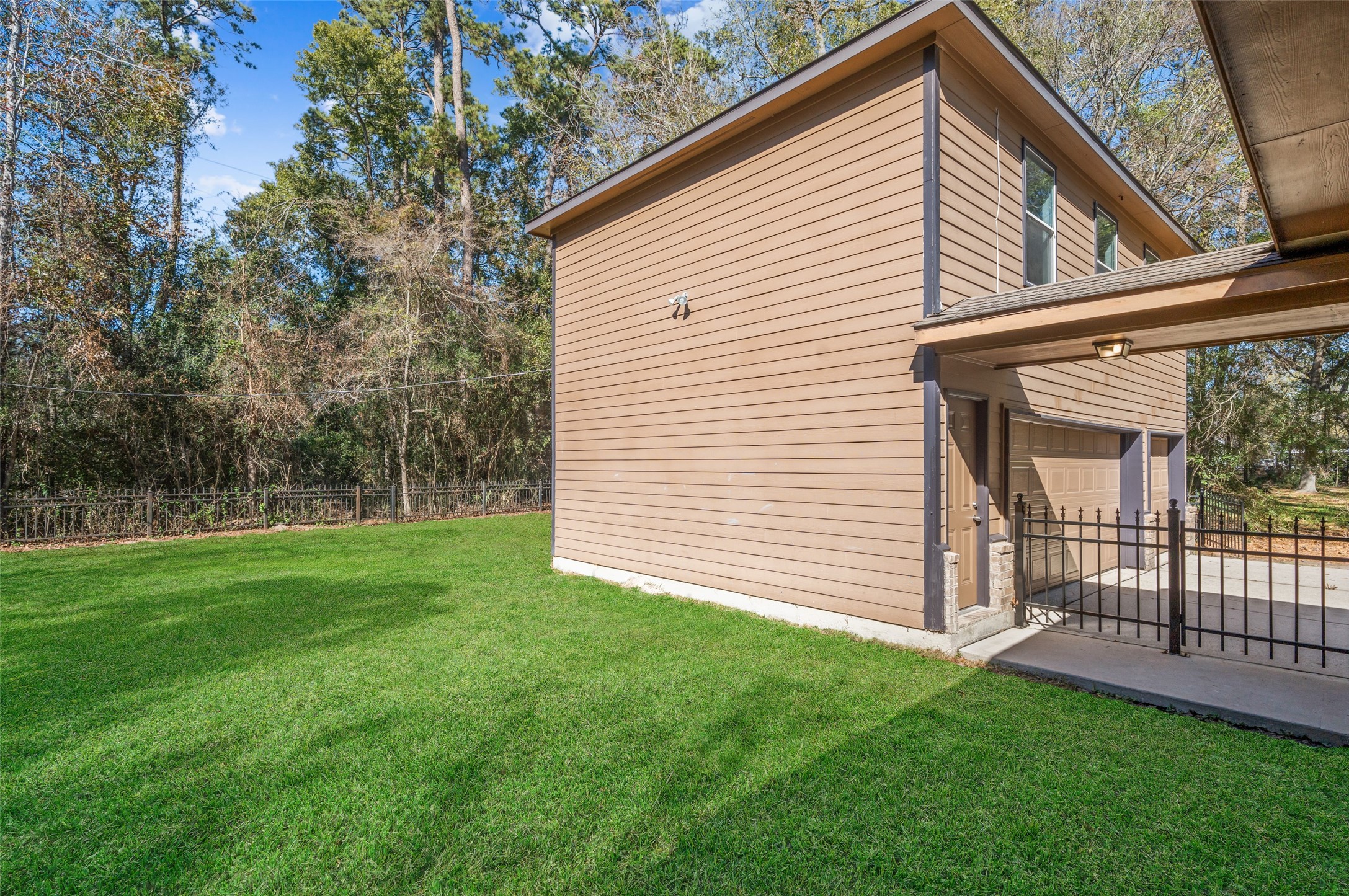 29627 Spring Forest Drive Spring, TX 77386 - Photo 29 of 35 a view of a backyard with wooden fence