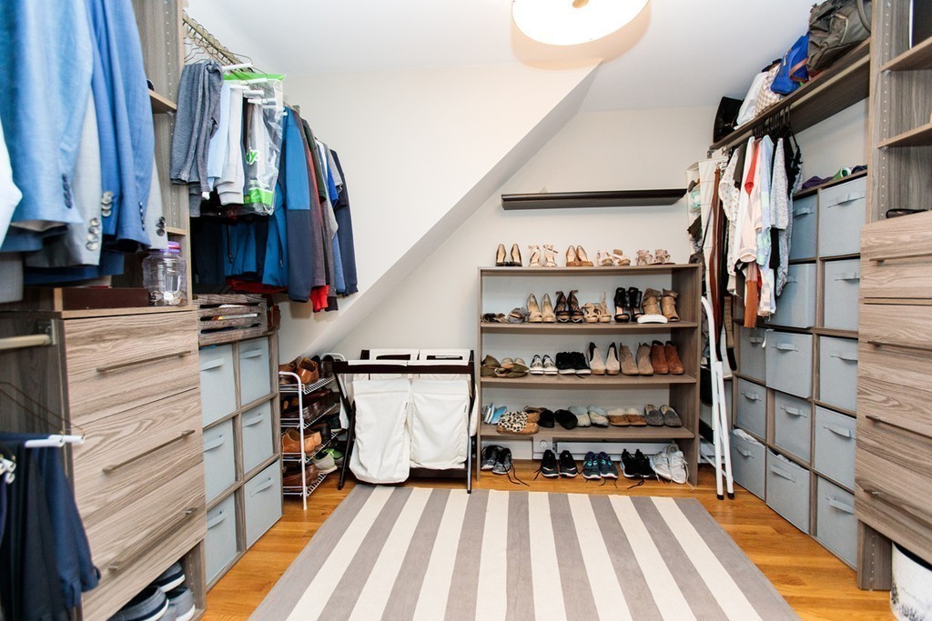 13 Pinewood Road Wellesley, MA 02482 - Photo 11 of 16 a view of walk in closet with clothes and shoes