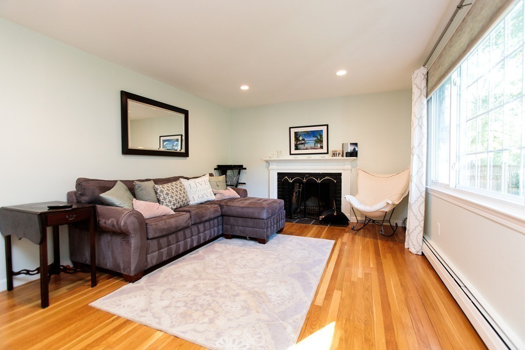 13 Pinewood Road Wellesley, MA 02482 - Photo 4 of 16 a living room with furniture and a fireplace