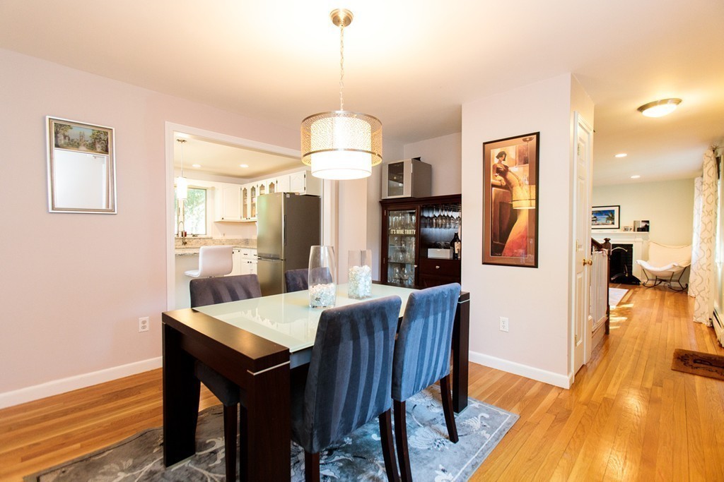 13 Pinewood Road Wellesley, MA 02482 - Photo 5 of 16 a view of a dining room with furniture and wooden floor