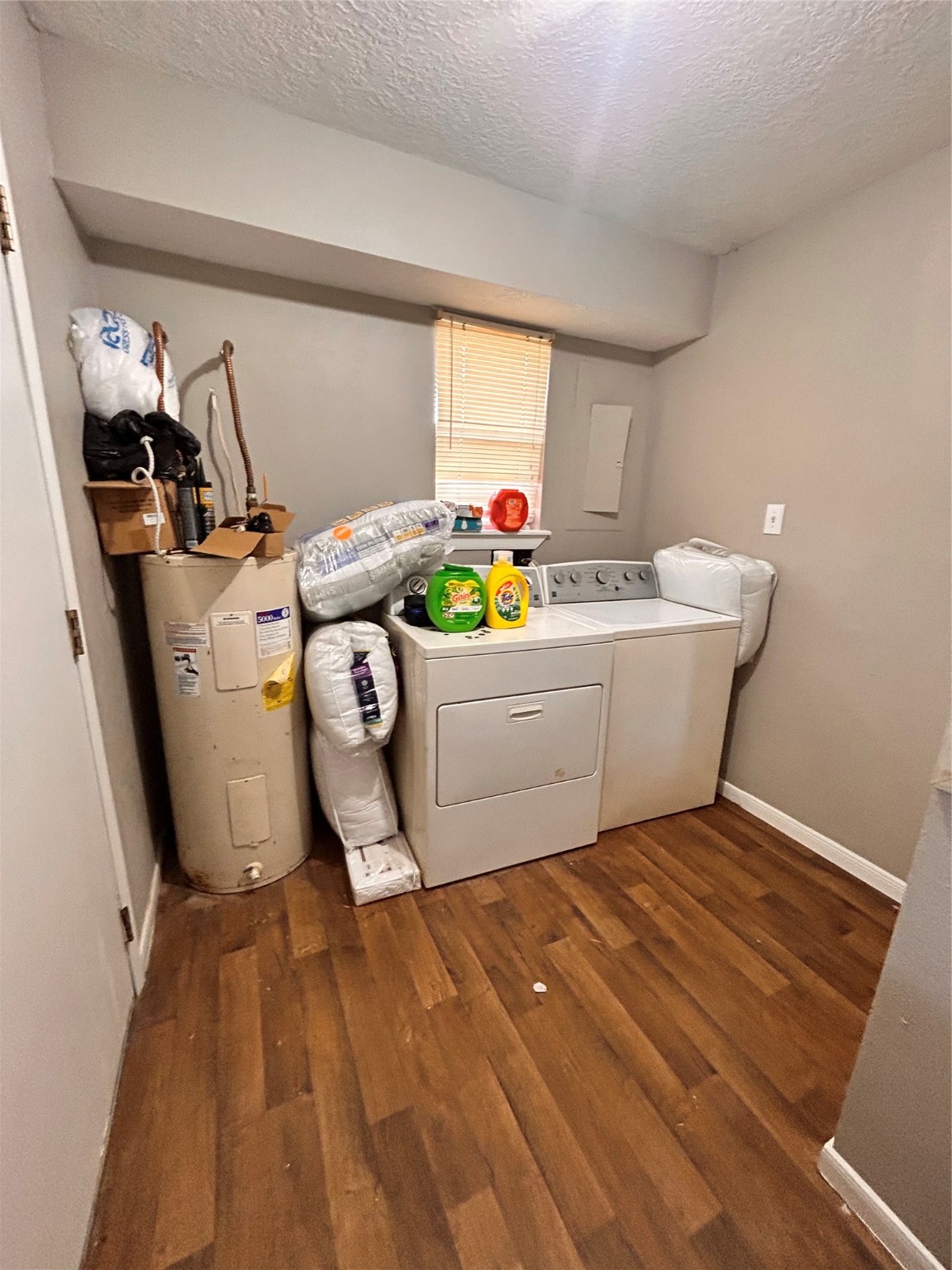 8118 Hamilton Road Brookshire, TX 77423 - Photo 10 of 22 a living room with a couch and a table