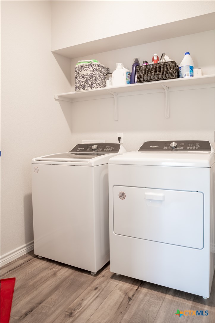 6243 Matagorda Road Belton, TX 76513 - Photo 21 of 27 a utility room with dryer and washer
