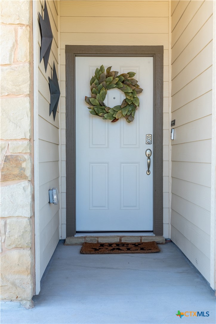 6243 Matagorda Road Belton, TX 76513 - Photo 3 of 27 a view of an entryway with wooden floor