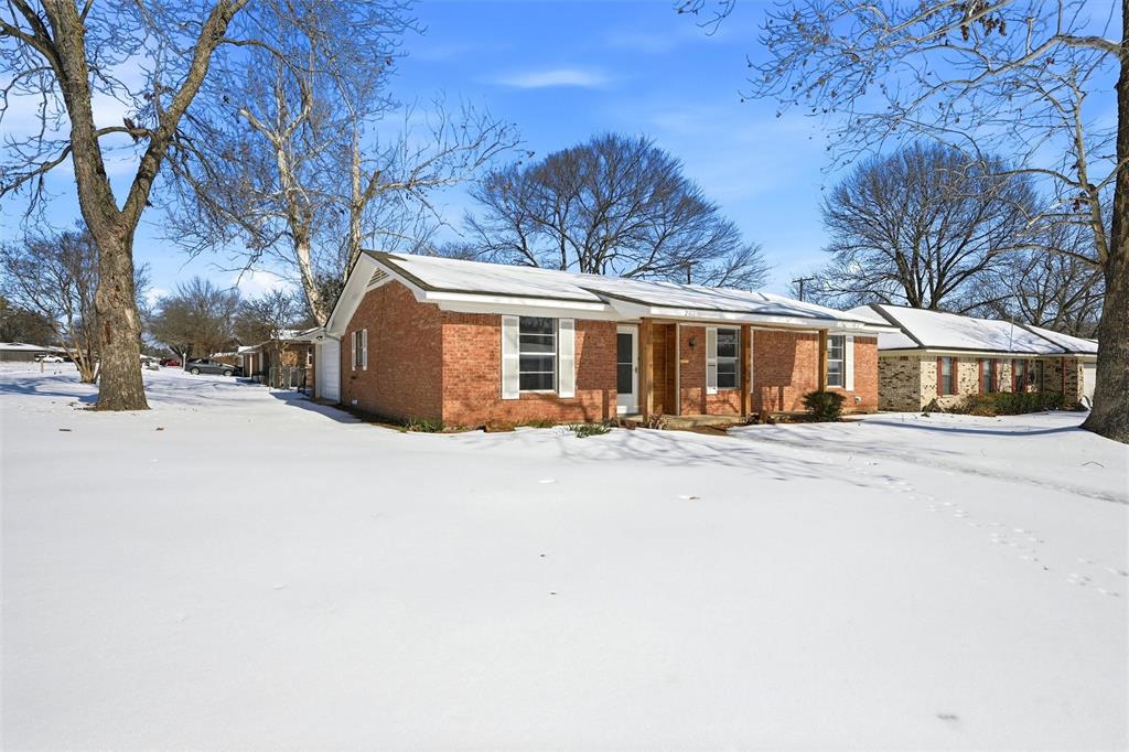 a front view of house with a yard
