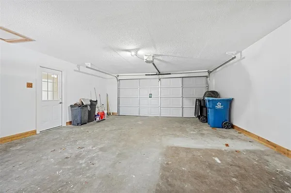 a view of a garage with furniture