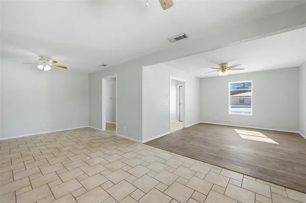 a view of an empty room and window