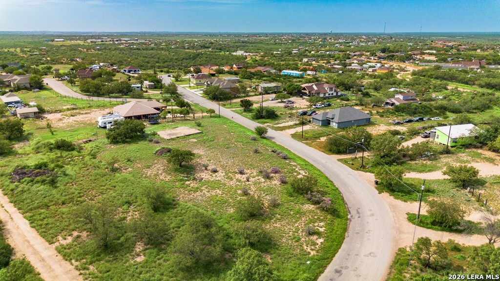 1326 Wagon Wheel Road Eagle Pass, TX 78852 - Photo 7 of 17 an aerial view of residential houses with outdoor space and trees