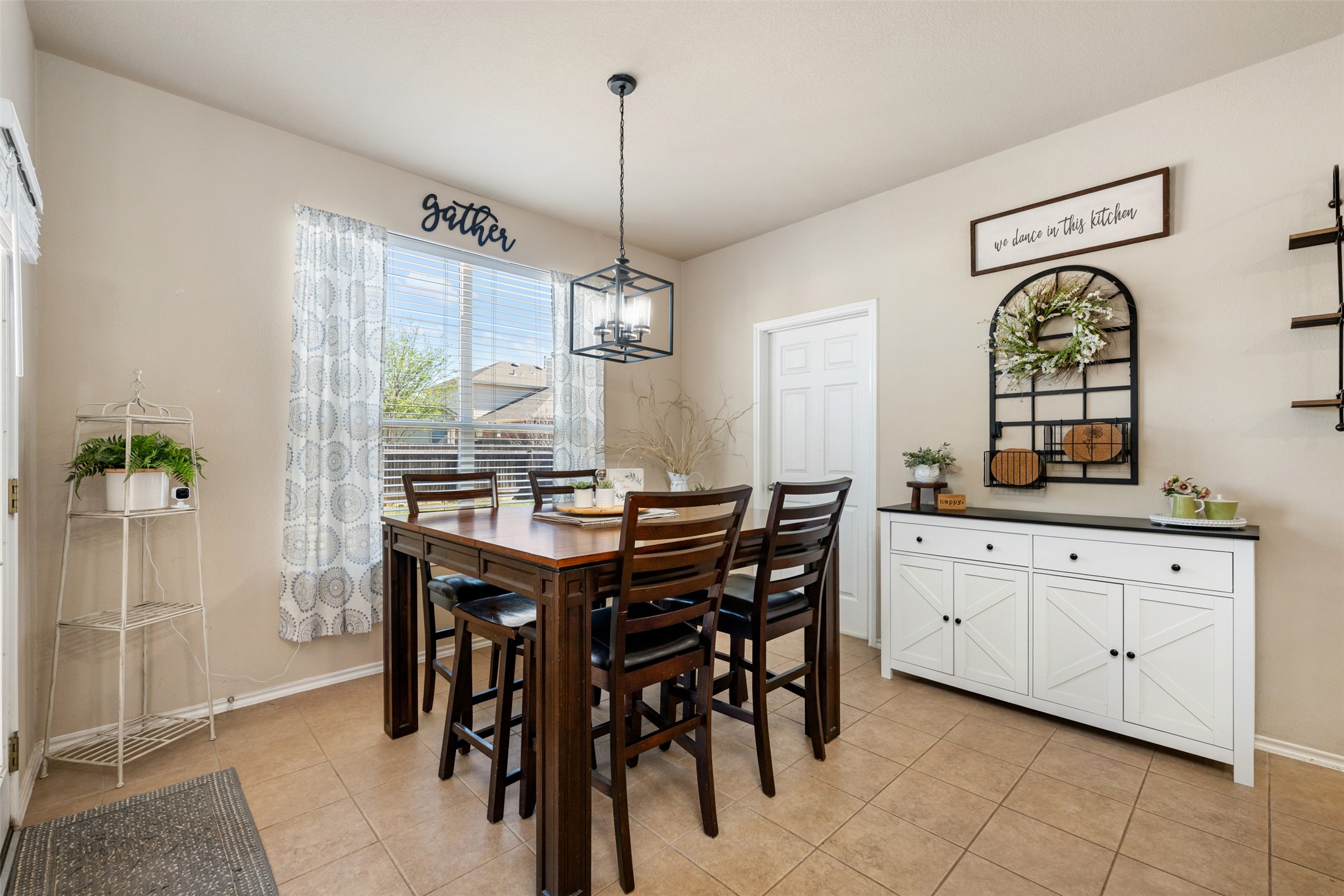 18300 Shallow Pool Drive Pflugerville, TX 78660 - Photo 16 of 40 a view of dining table and chairs in a room