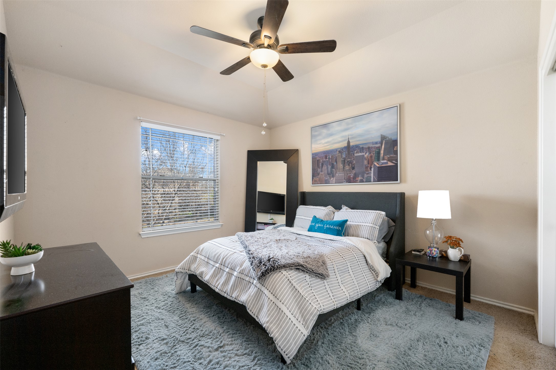 18300 Shallow Pool Drive Pflugerville, TX 78660 - Photo 27 of 40 a bedroom with a bed and a desk