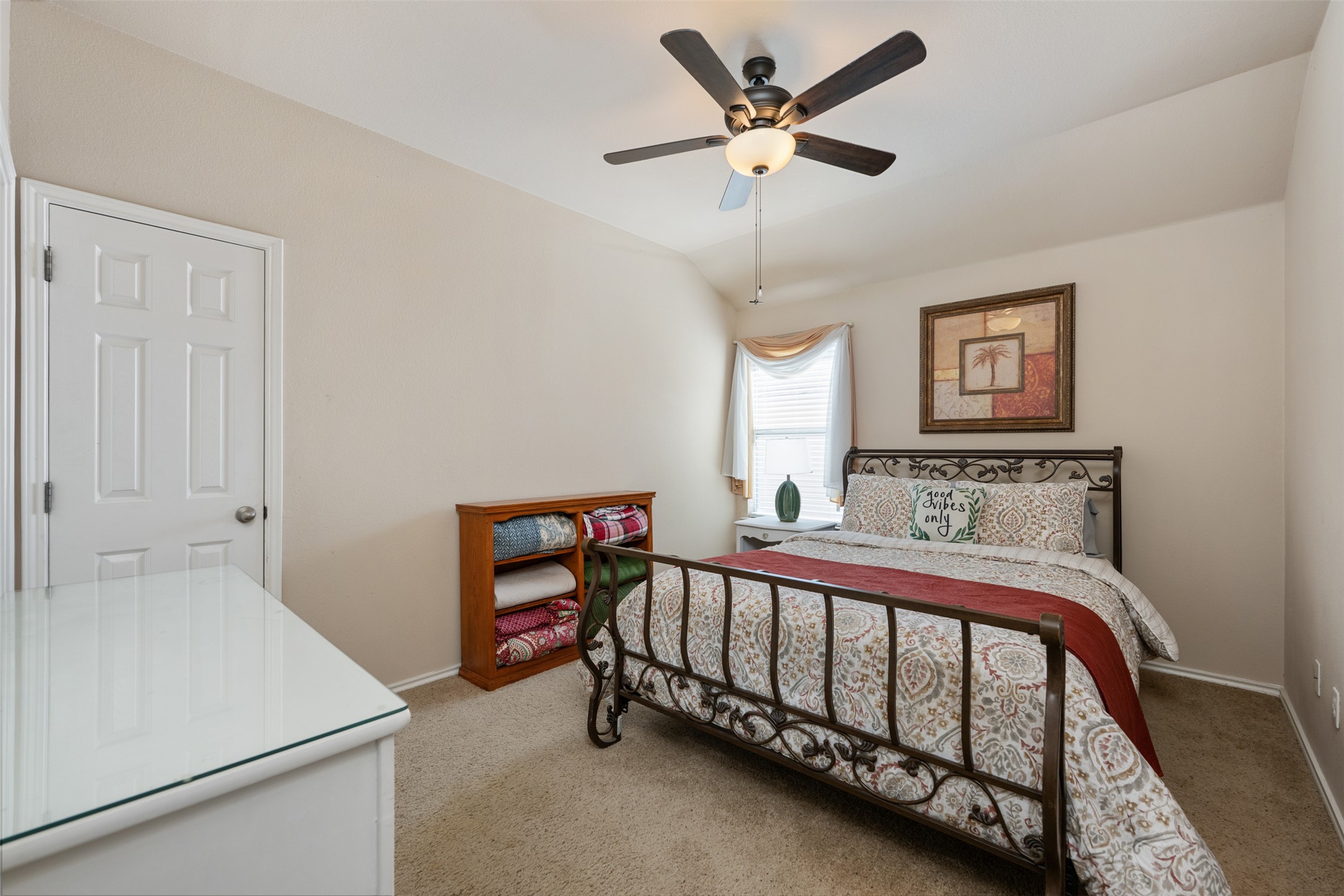 18300 Shallow Pool Drive Pflugerville, TX 78660 - Photo 29 of 40 a bedroom with a bed and a chandelier