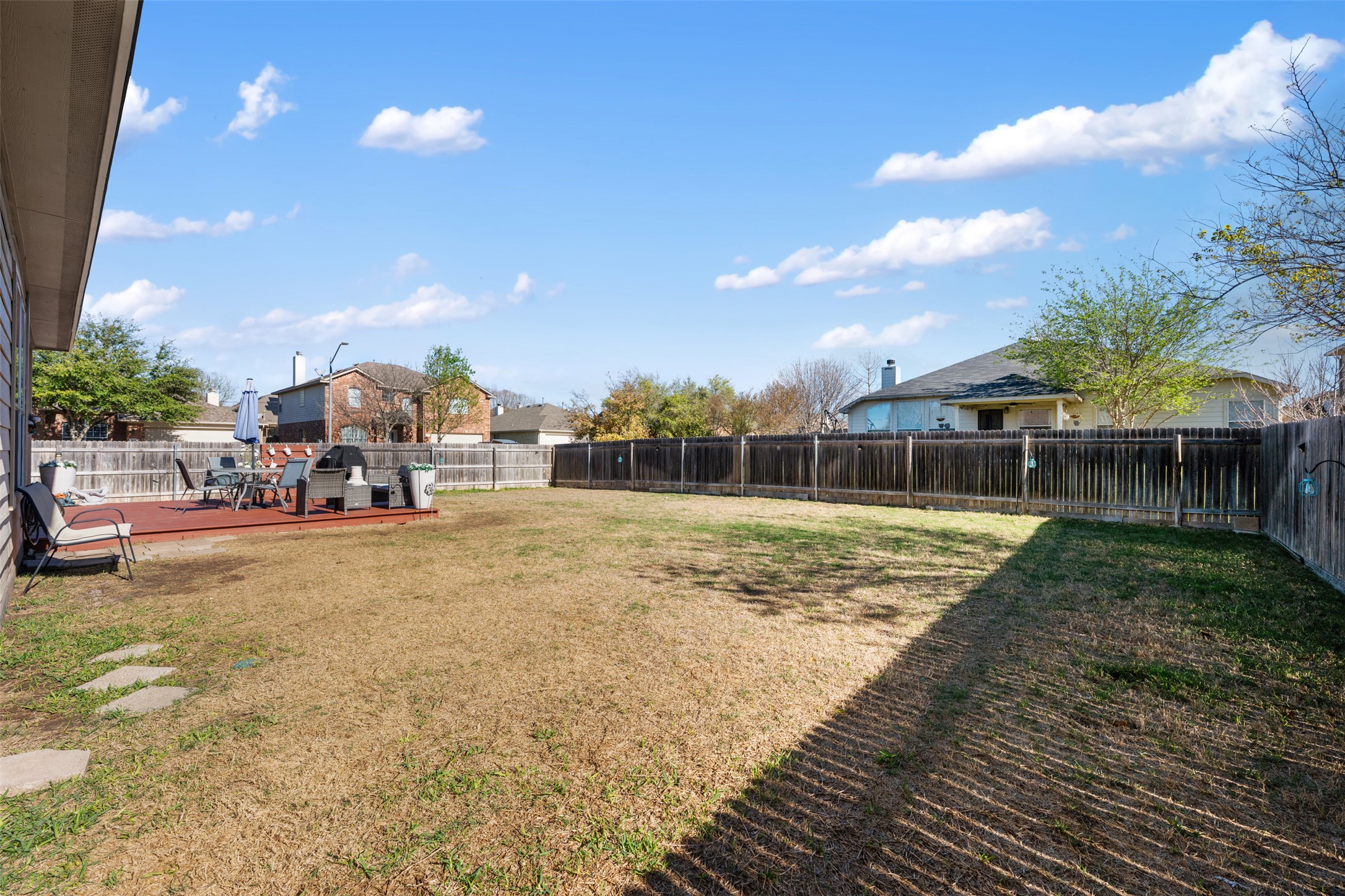 18300 Shallow Pool Drive Pflugerville, TX 78660 - Photo 34 of 40 a view of a house with a yard