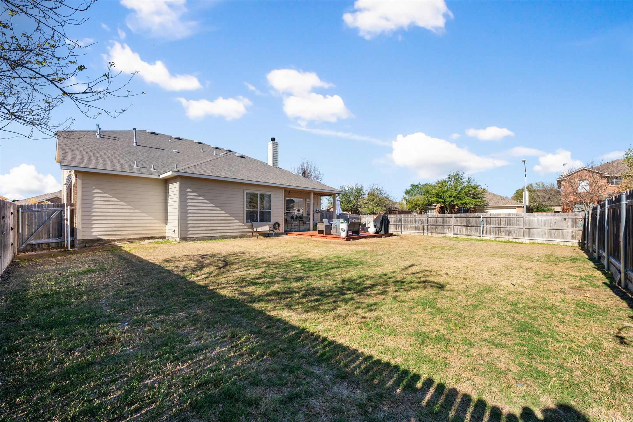 18300 Shallow Pool Drive Pflugerville, TX 78660 - Photo 7 of 40 a swimming pool with outdoor seating and yard