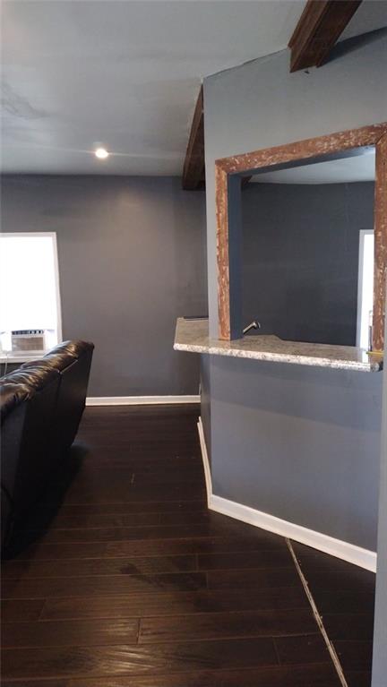 136 Hill Street Commerce, GA 30529 - Photo 10 of 27 a room with wooden floor and a window