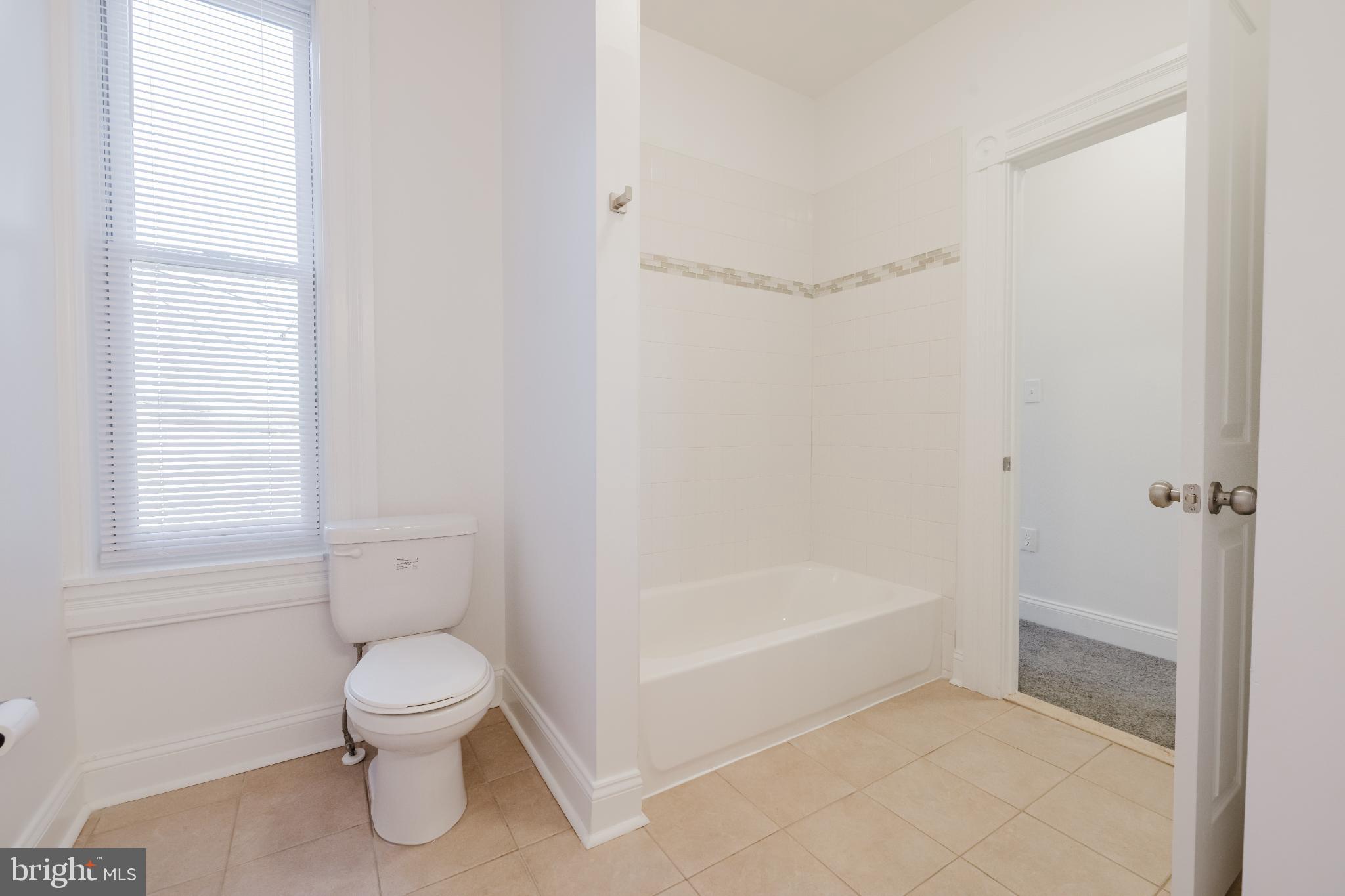 1237 North Broadway Baltimore, MD 21213 - Photo 13 of 25 Upper 1 - Full Hall bathroom