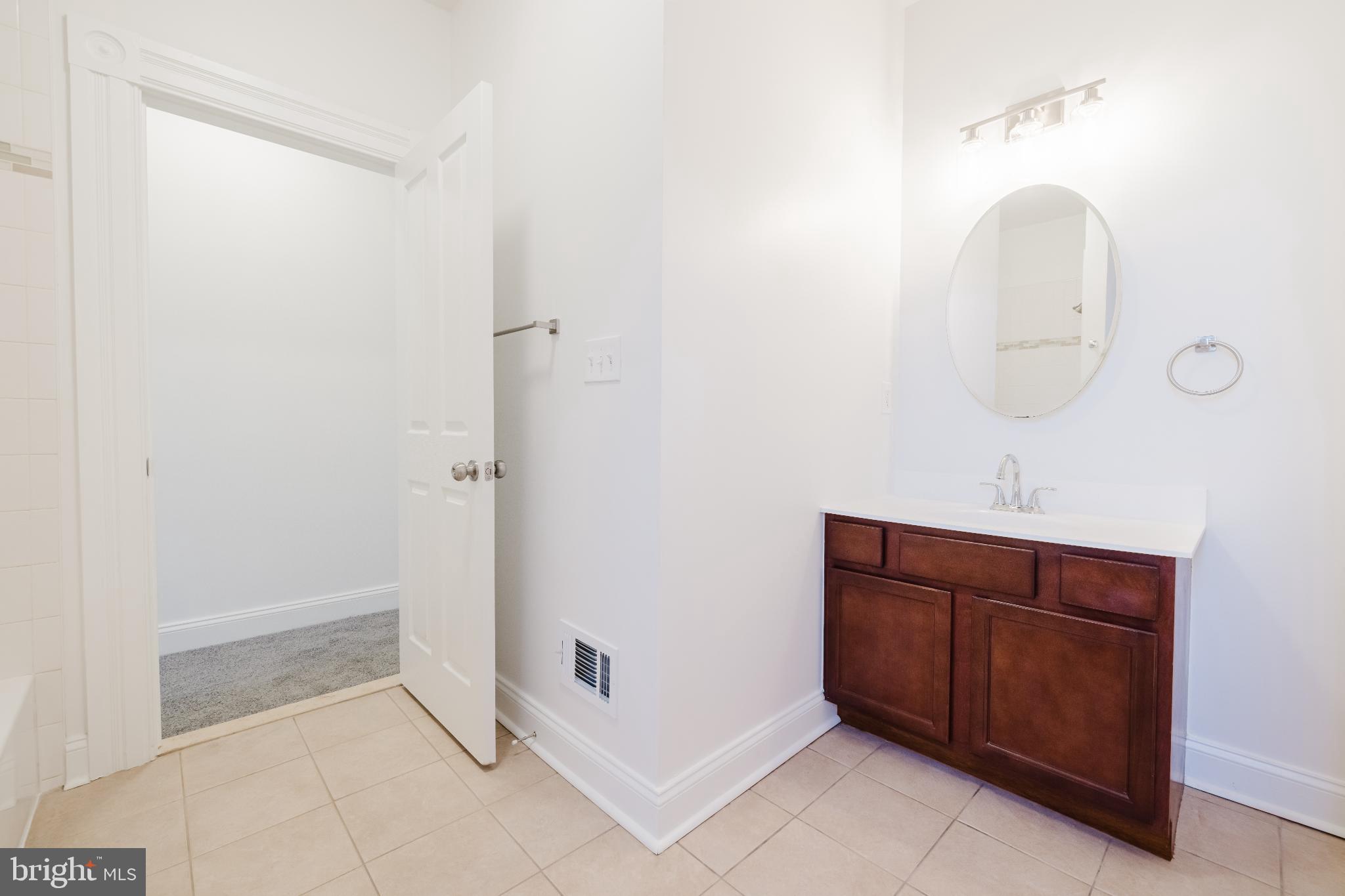 1237 North Broadway Baltimore, MD 21213 - Photo 14 of 25 Upper 1 - Full hall bathroom