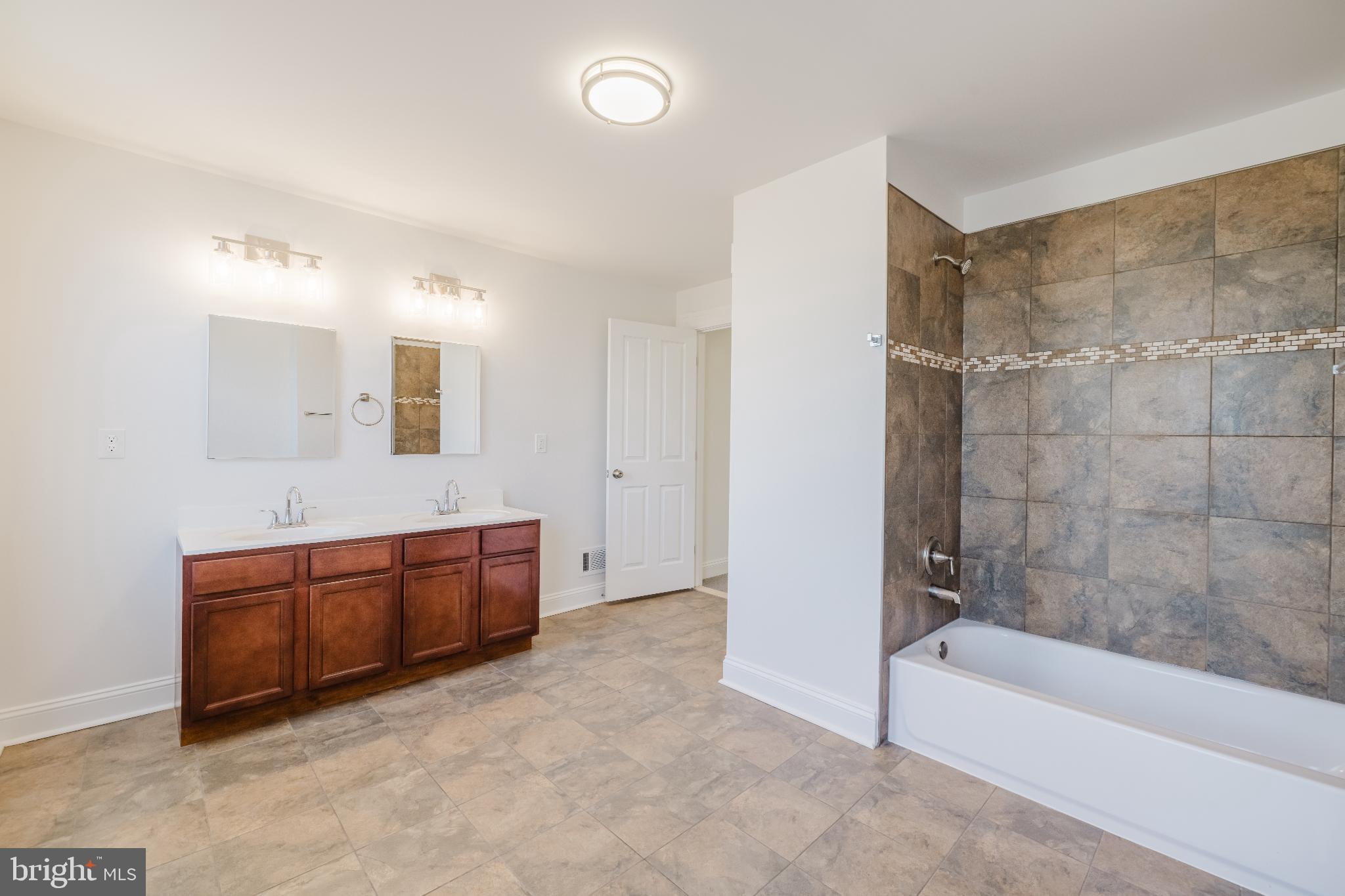 1237 North Broadway Baltimore, MD 21213 - Photo 19 of 25 Spacious bathroom with elegant finishes.