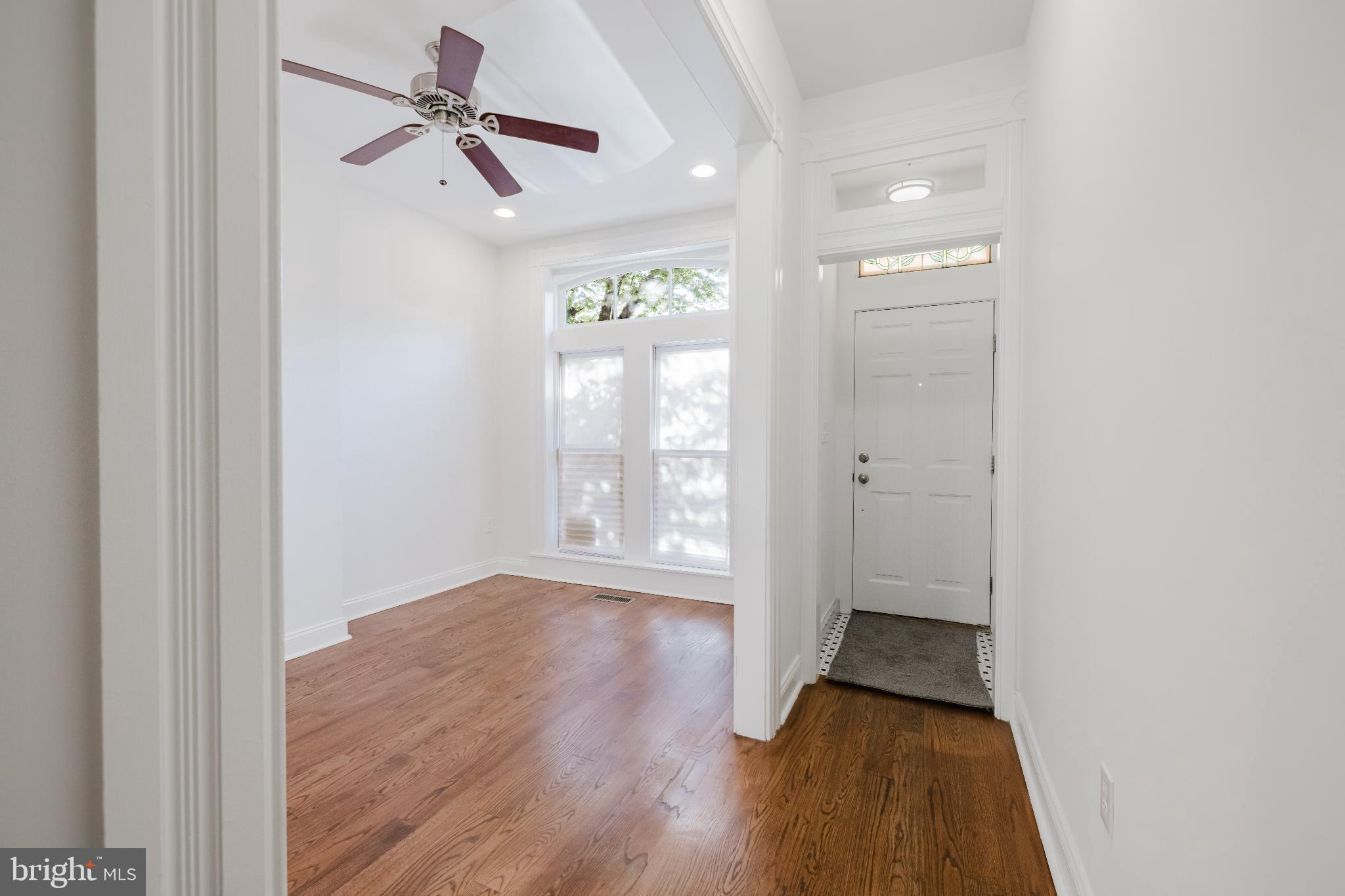 1237 North Broadway Baltimore, MD 21213 - Photo 2 of 25 Bright entryway with elegant wood floors.