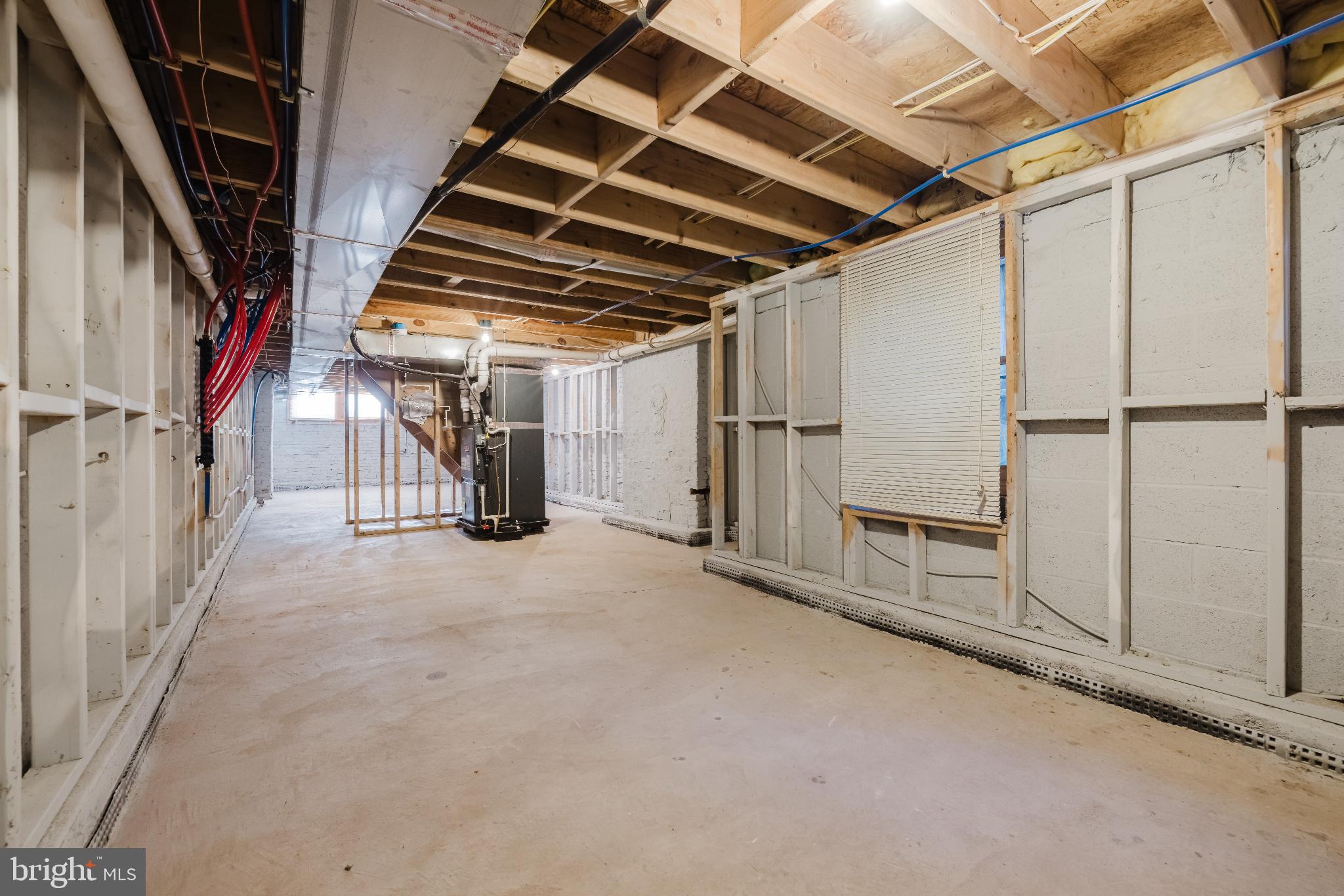 1237 North Broadway Baltimore, MD 21213 - Photo 21 of 25 Spacious unfinished basement ready for your ideas.