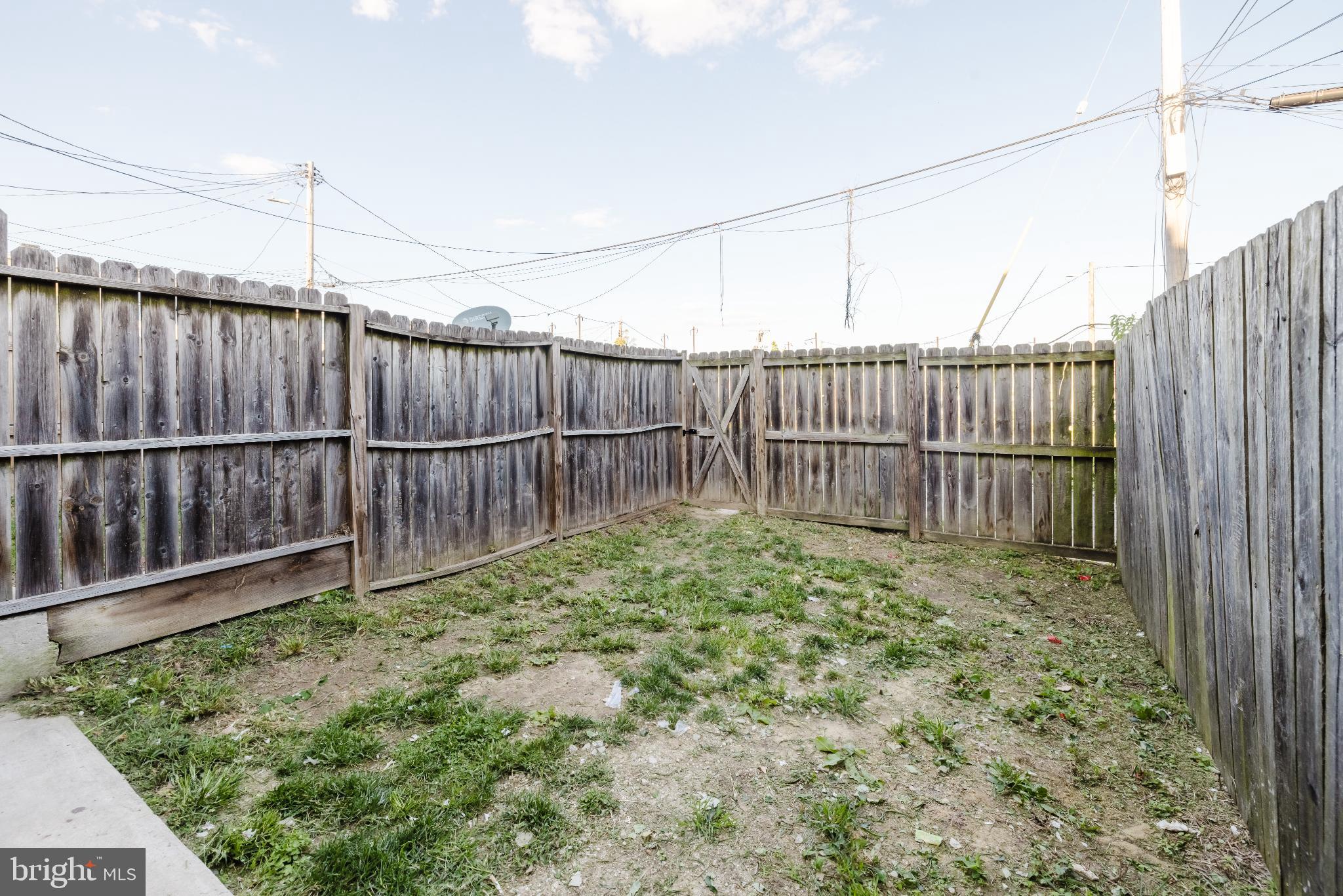 1237 North Broadway Baltimore, MD 21213 - Photo 25 of 25 Private outdoor space with rustic fencing.