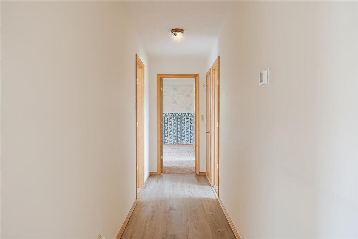 64515 Rock Springs Road Bend, OR 97703 - Photo 17 of 49 Hallway to Bedrooms