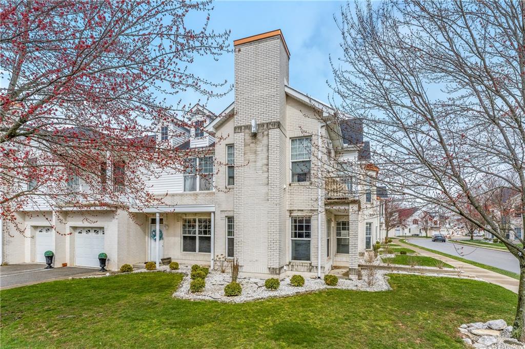 216 Adams Pointe Boulevard, Unit 10 Mars, PA 16046 - Photo 28 of 33 a front view of house with yard