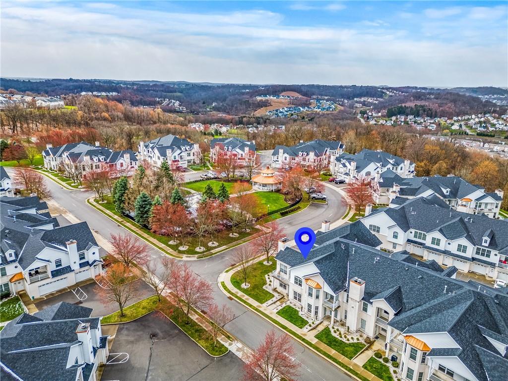 216 Adams Pointe Boulevard, Unit 10 Mars, PA 16046 - Photo 32 of 33 an aerial view of residential houses with outdoor space