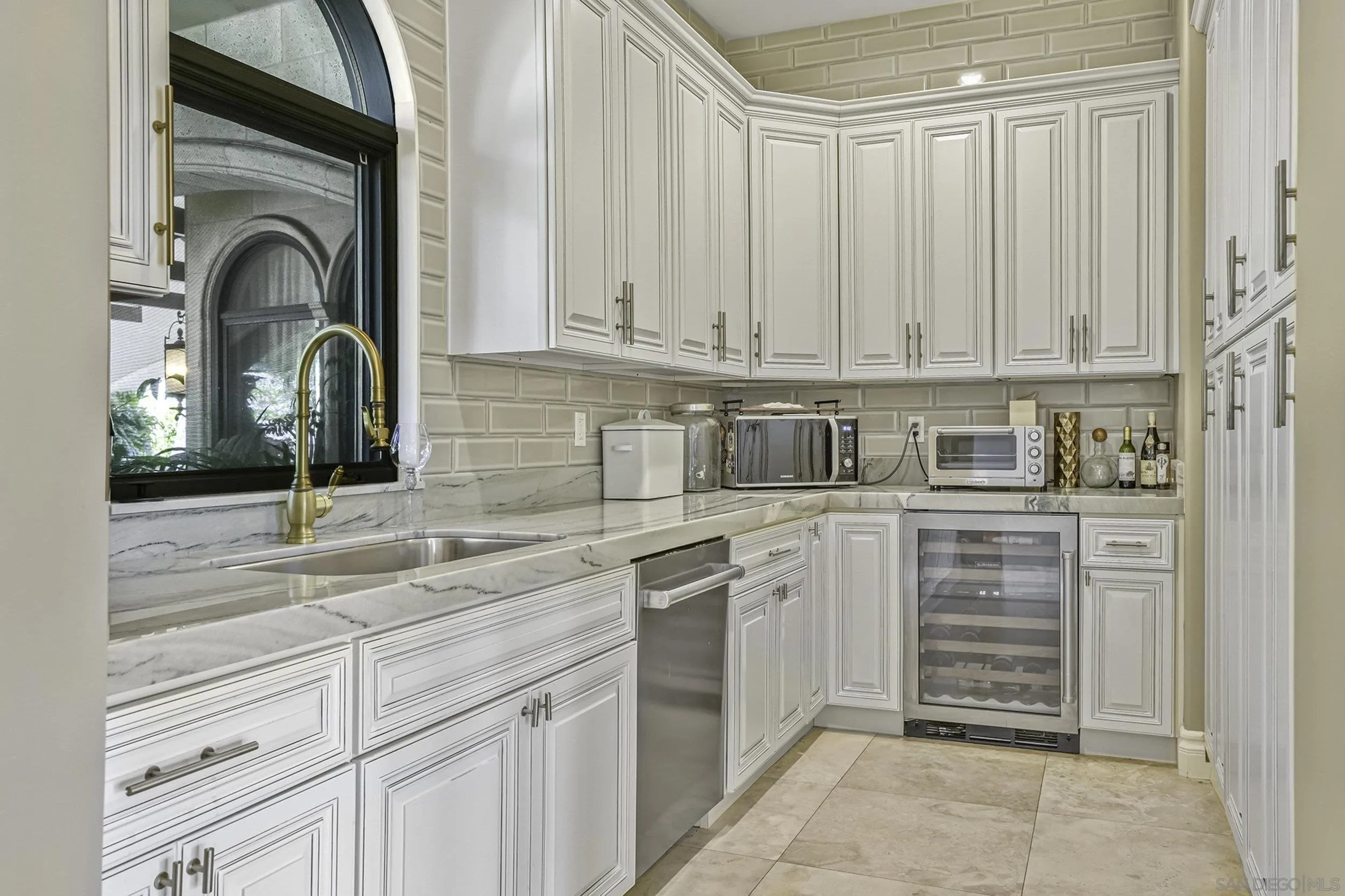 5305 La Crescenta Road Rancho Santa Fe, CA 92067 - Photo 11 of 63 This spacious prep/side kitchen includes a beverage fridge fridge, prep sink and another dishwasher, as well as plenty of pantry storage .