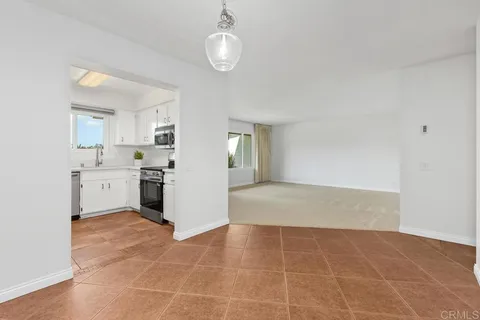 a view of a kitchen with a sink cabinets and window