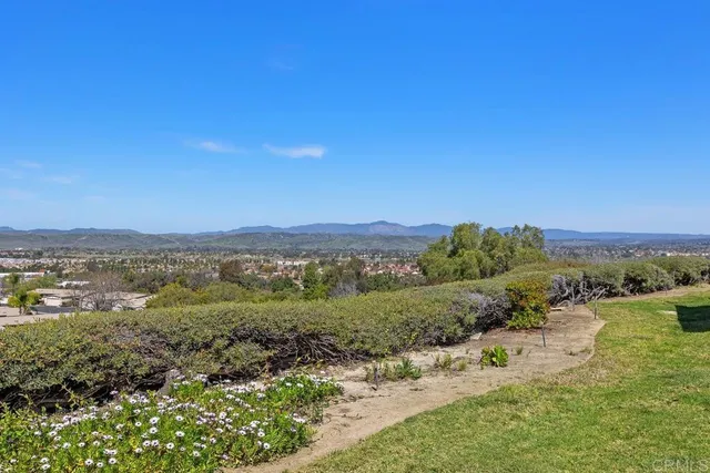 a view of a lake with mountains in the background