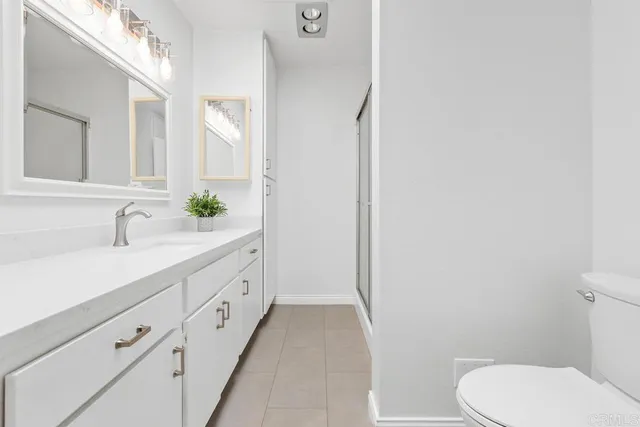 an aerial view of residential house with outdoor space