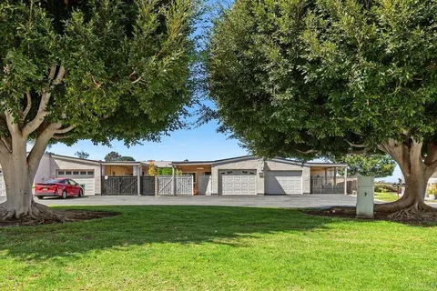 an aerial view of a house with roof view