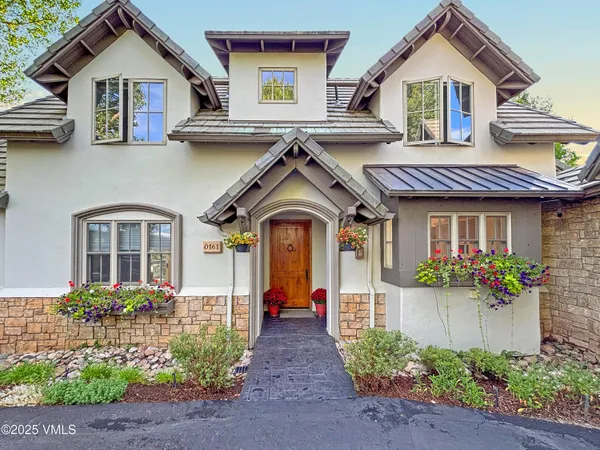 a front view of a house with a porch