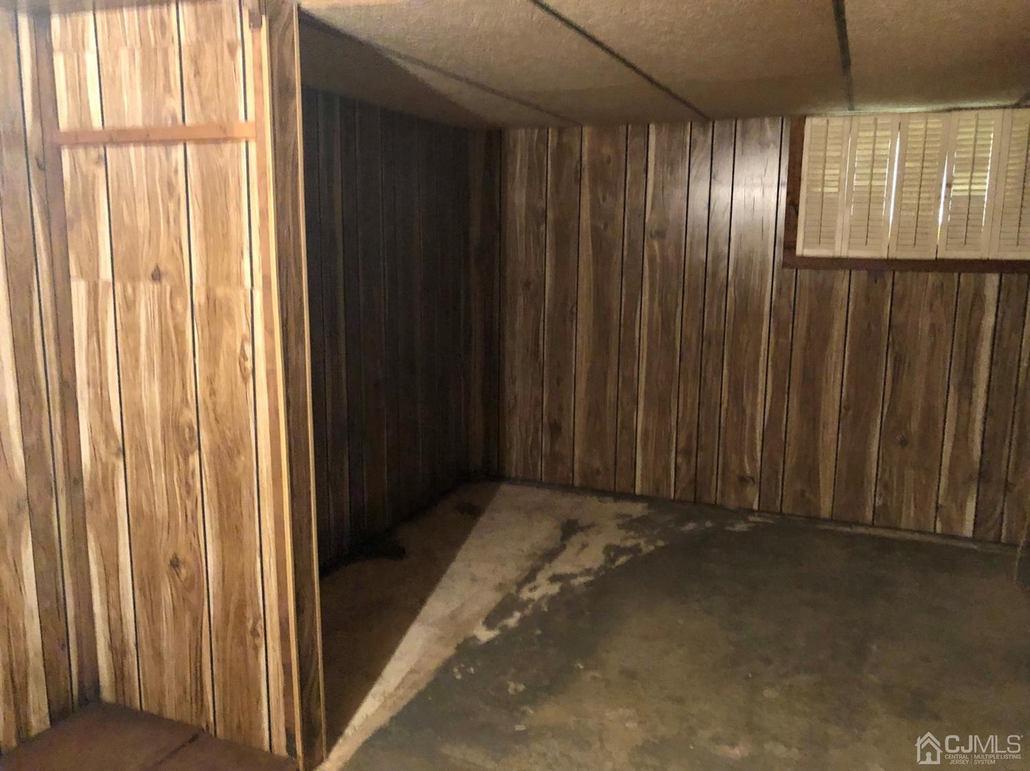 7 Spring Hill Road Old Bridge, NJ 07747 - Photo 9 of 11 a view of empty room with windows
