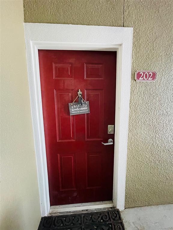 8201 Claire Ann Drive, Unit 202 Orlando, FL 32825 - Photo 3 of 17 a view of door
