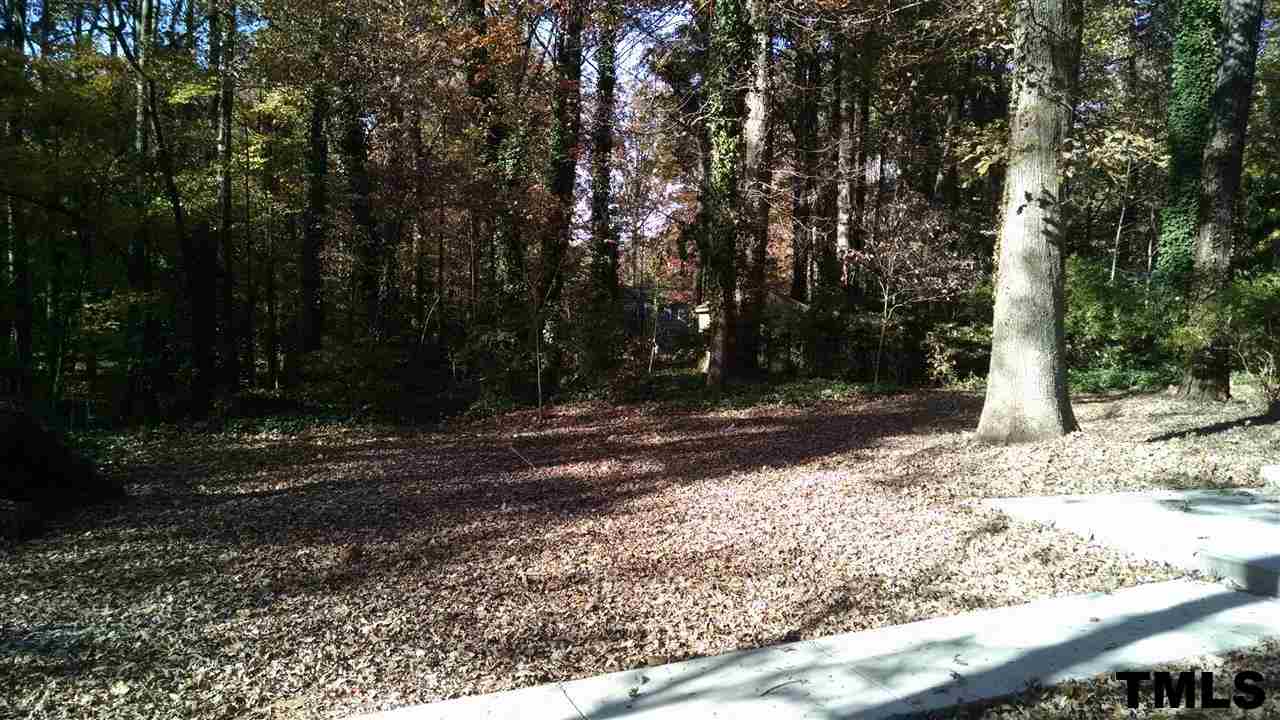 1224 Kingston Ridge Road Cary, NC 27511 - Photo 20 of 24 Mature trees everywhere, and enough space to plant your favorite landscaping.