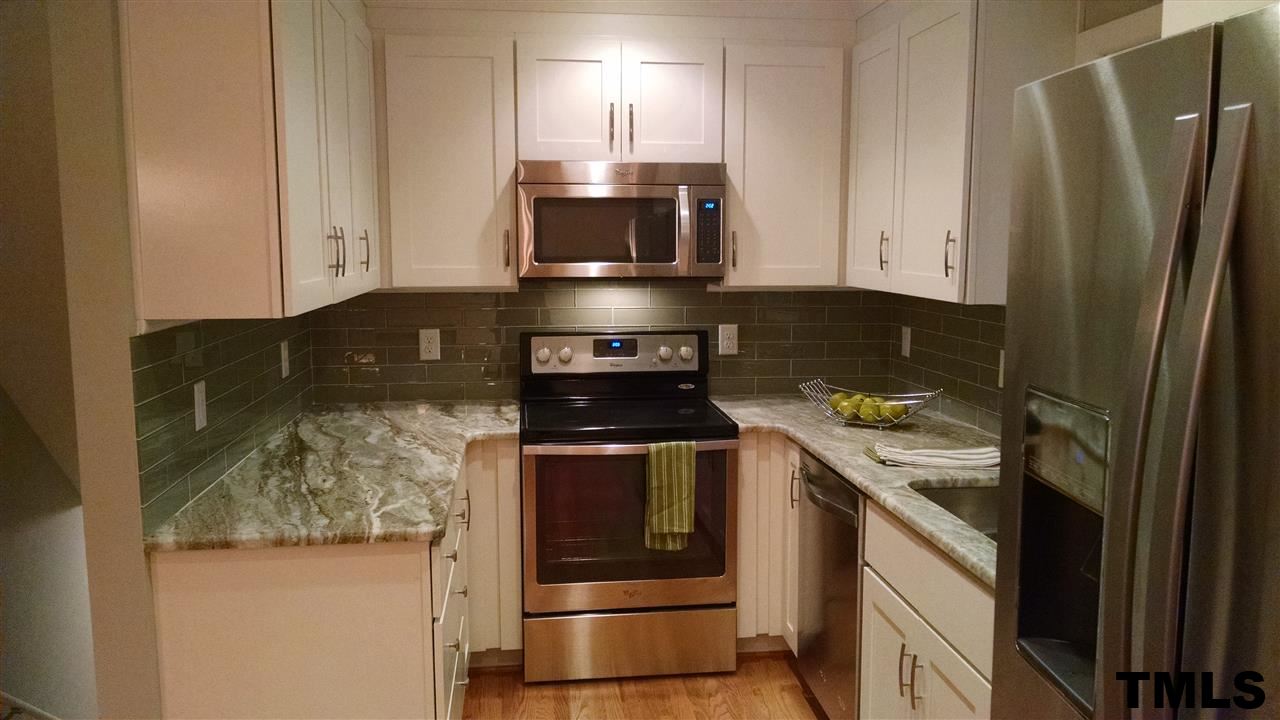 1224 Kingston Ridge Road Cary, NC 27511 - Photo 5 of 24 Matching, high end appliances. You will love the french door fridge!