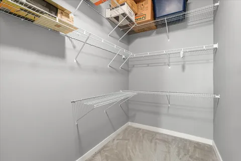 a view of a room with racks on the wall