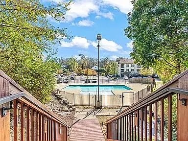 414 Rosedale Avenue, Unit 301 Nashville, TN 37211 - Photo 20 of 21 a view of a balcony with wooden floor and fence