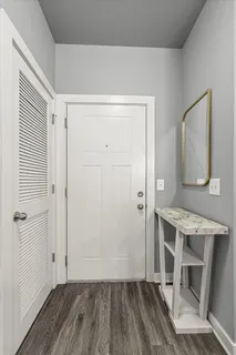 a view of kitchen with wooden floor