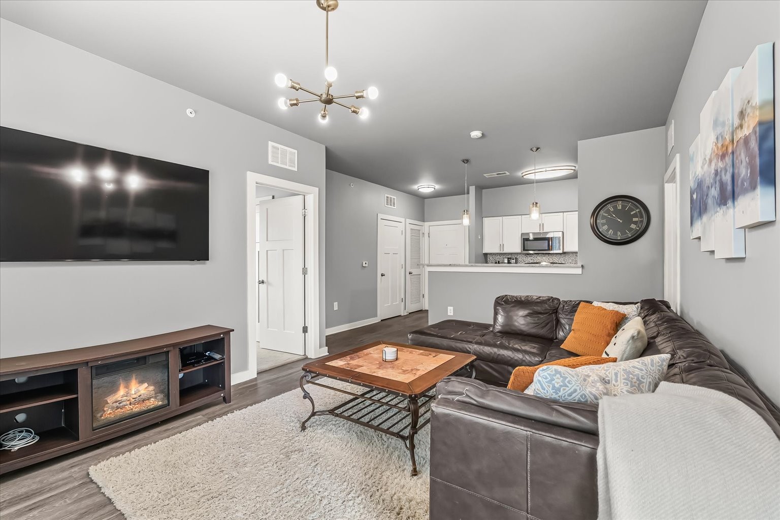 414 Rosedale Avenue, Unit 301 Nashville, TN 37211 - Photo 5 of 21 a living room with furniture and a flat screen tv