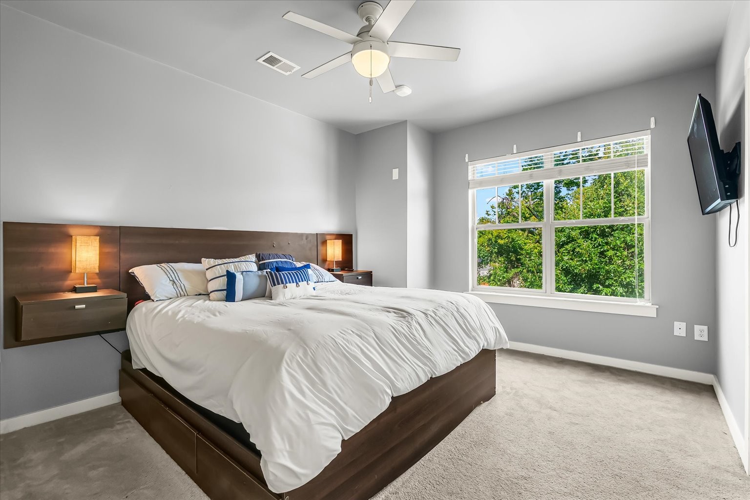 414 Rosedale Avenue, Unit 301 Nashville, TN 37211 - Photo 9 of 21 a bedroom with a bed and a tv