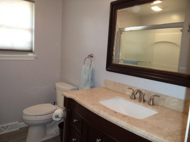 110 Cedar Ridge Drive Monaca, PA 15061 - Photo 17 of 22 Main Bathroom (recently updated) with ceramic tile flooring