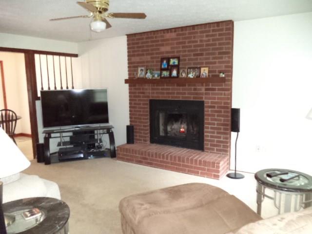 110 Cedar Ridge Drive Monaca, PA 15061 - Photo 8 of 22 Family Room with wood burning brick fireplace