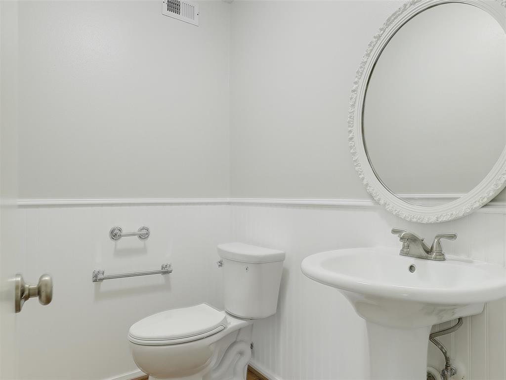 4079 Calculus Drive Dallas, TX 75244 - Photo 15 of 26 a bathroom with a sink a toilet and a mirror