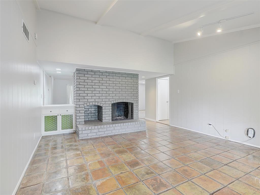 4079 Calculus Drive Dallas, TX 75244 - Photo 17 of 26 a view of an empty room with a fireplace