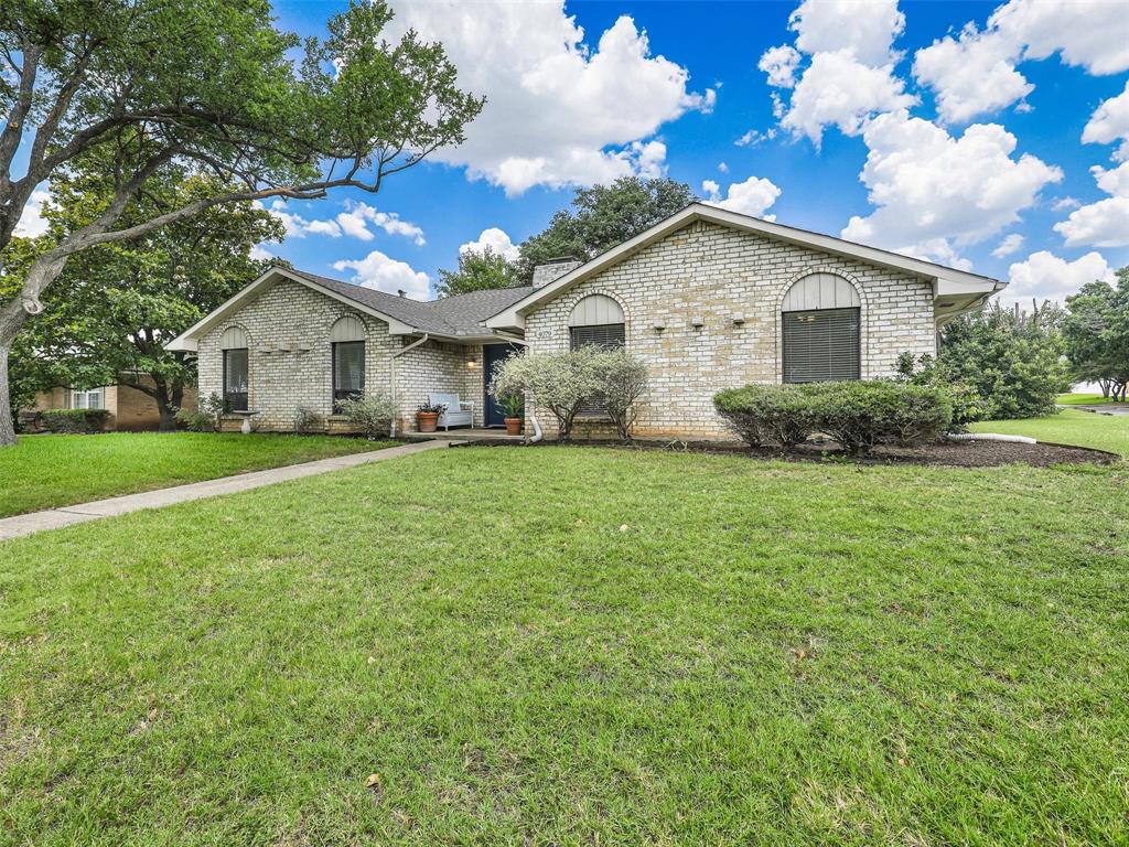 4079 Calculus Drive Dallas, TX 75244 - Photo 3 of 26 a front view of house with yard and green space
