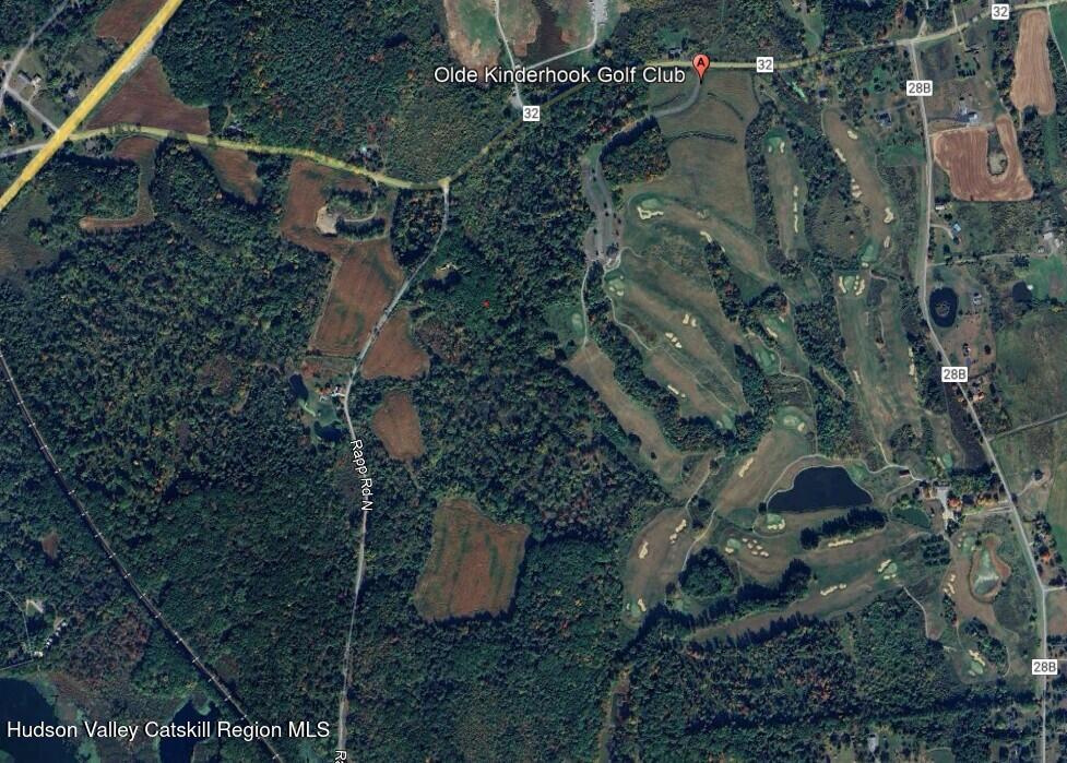 an aerial view of residential house with outdoor space