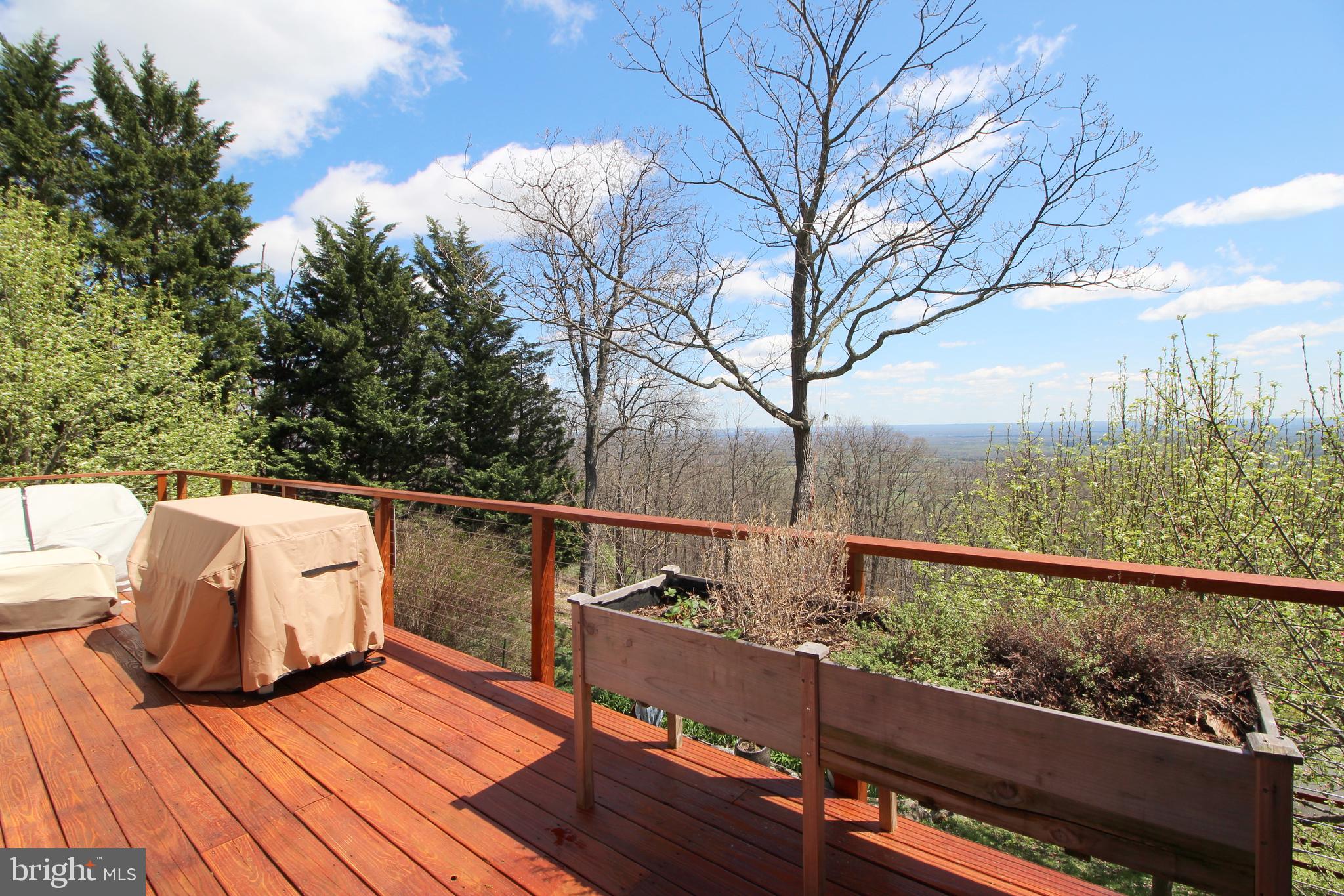 2602 Lookout Road Haymarket, VA 20169 - Photo 16 of 32 a view of balcony with wooden floor and outdoor seating